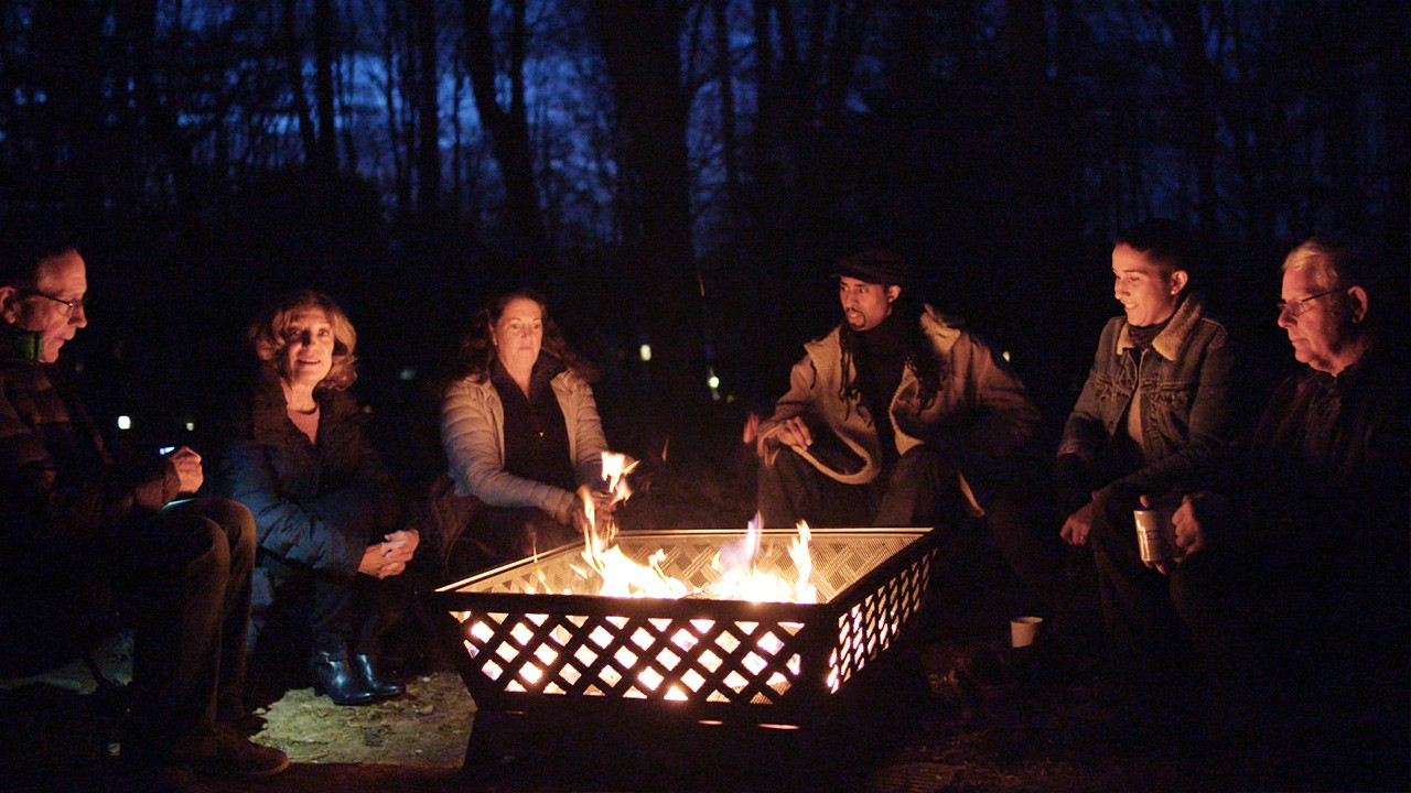 telling scary stories at the campfire (from