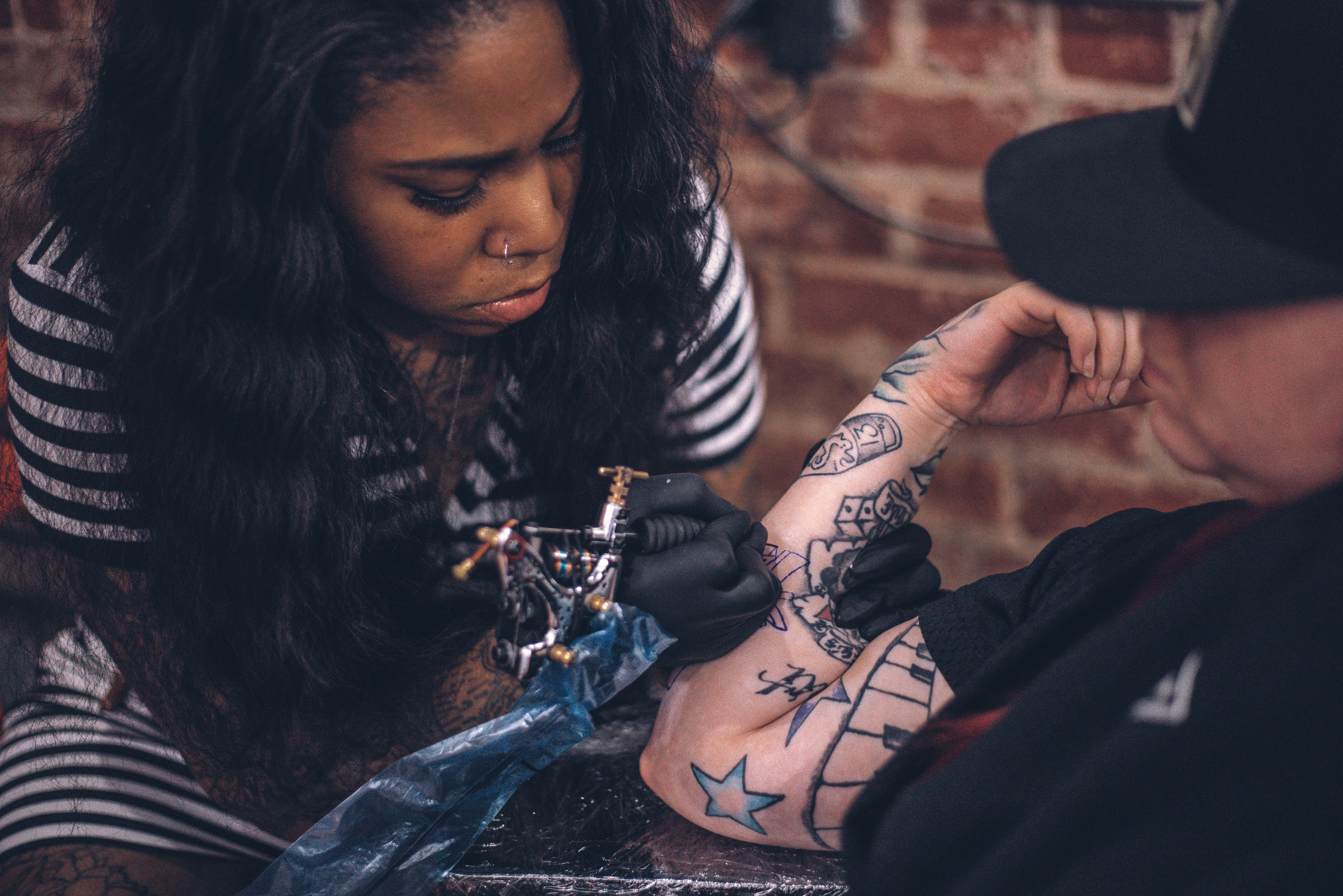 Unisex Female Tattoo Artist