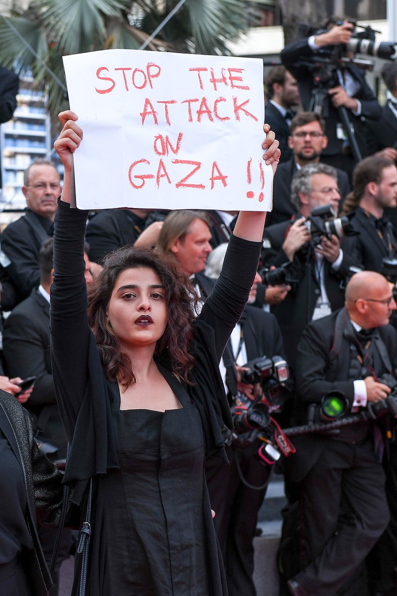 cannes’ filmmakers and actors stage powerful red carpet protest in