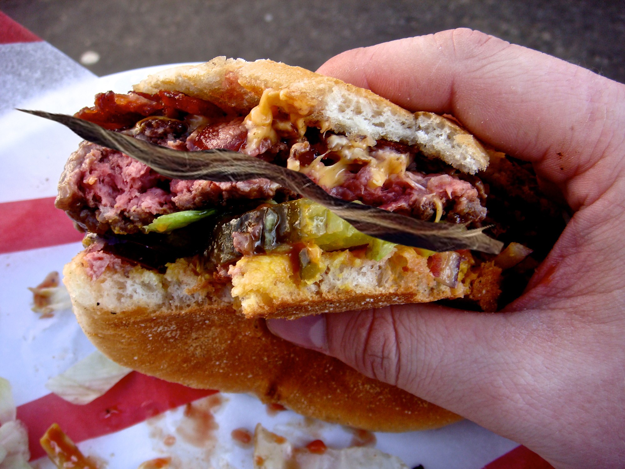 Delivery Service Says Cursed Hair Found In Burger Is A Matter Of Personal Taste