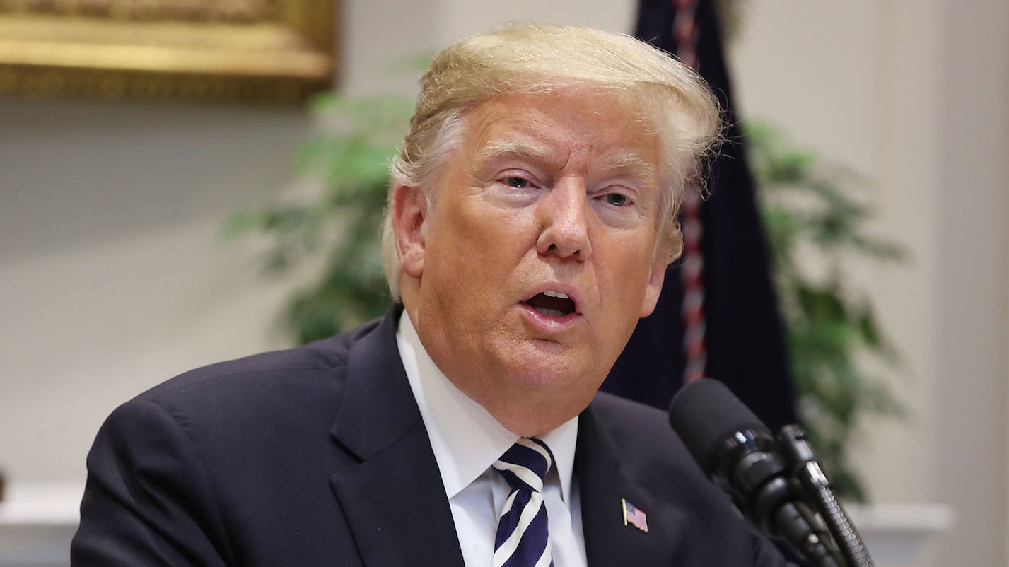 Trump tells U.S. troops at the border to open fire on migrants throwing rocks