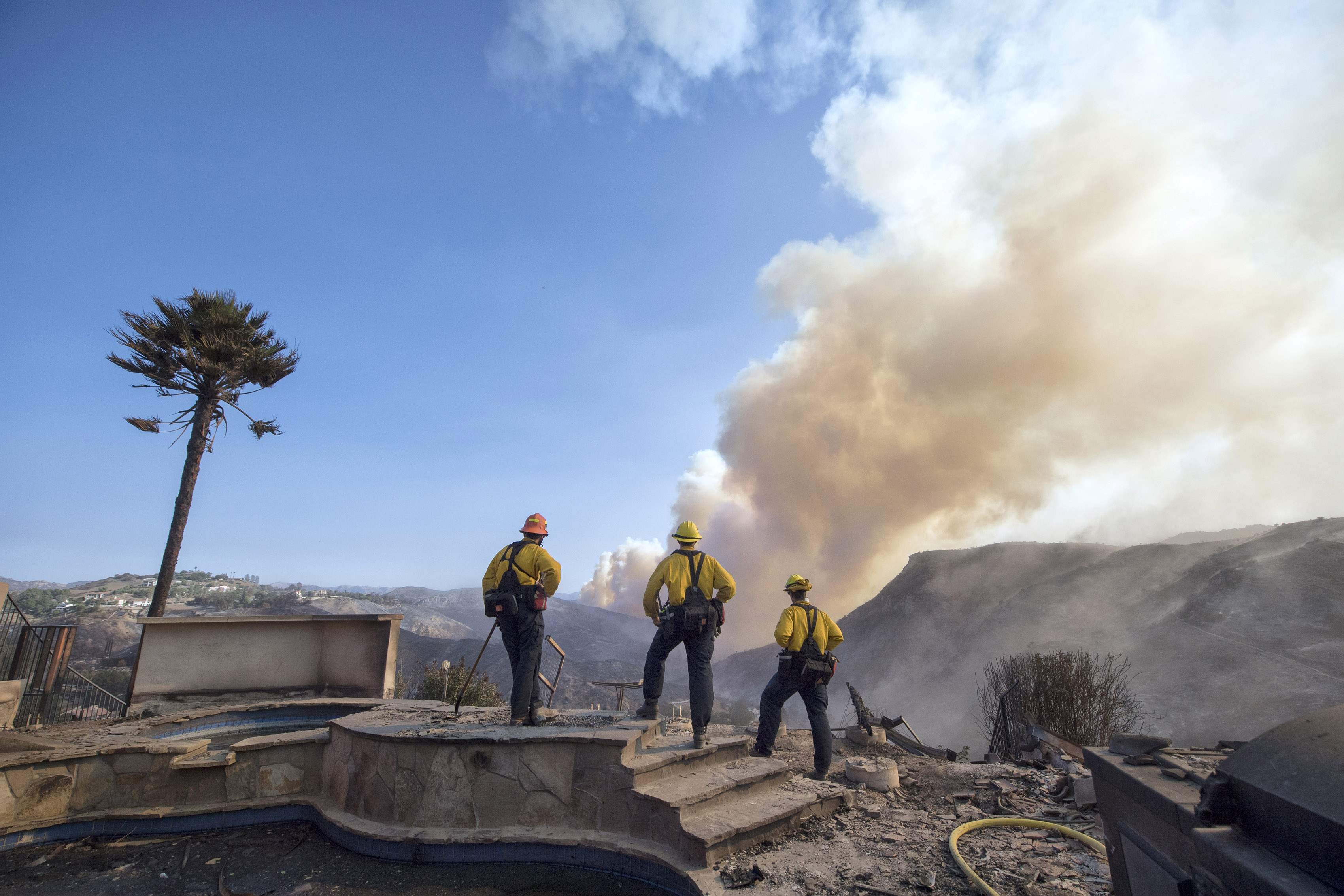 Photos Capture The Utter Devastation From The Deadliest Wildfires In ...