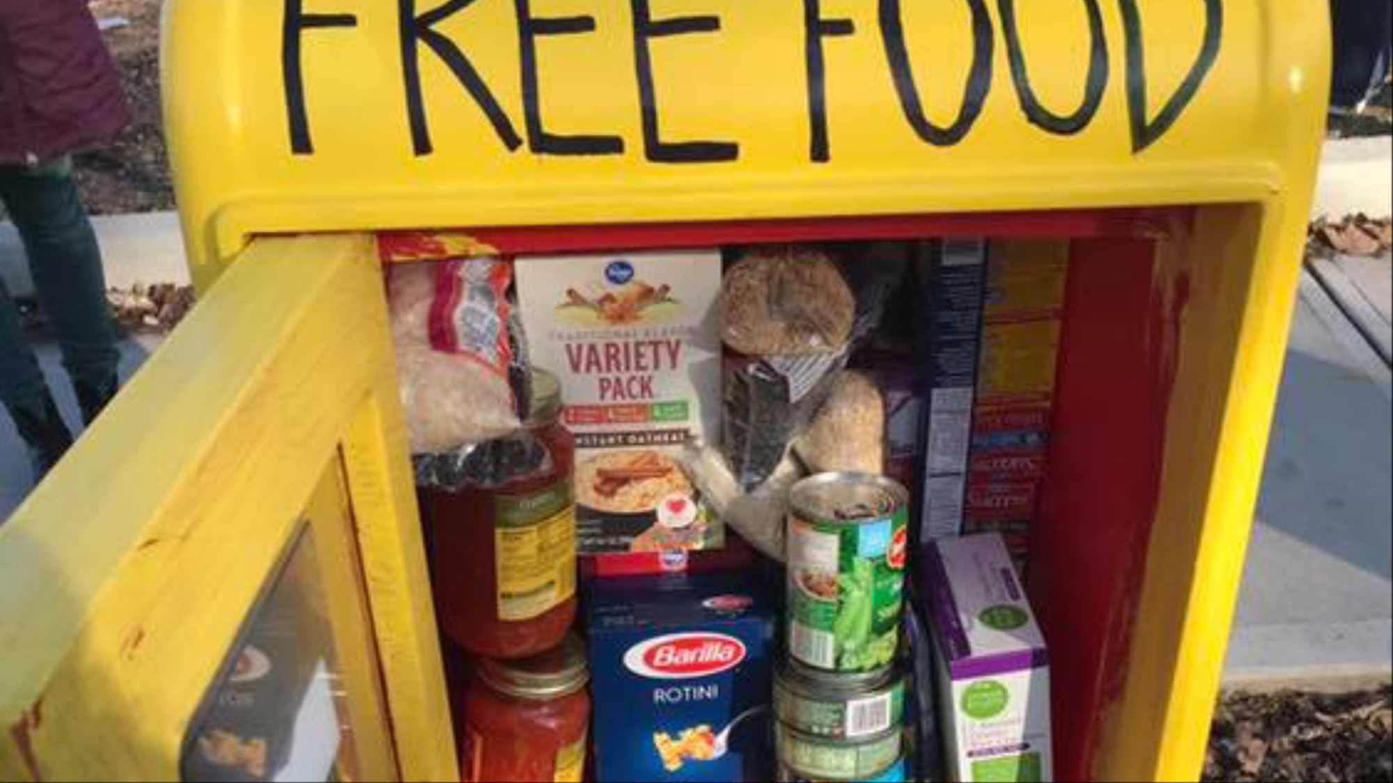 Community Food Box Pops Up In Front Of Gentrifying Restaurant In