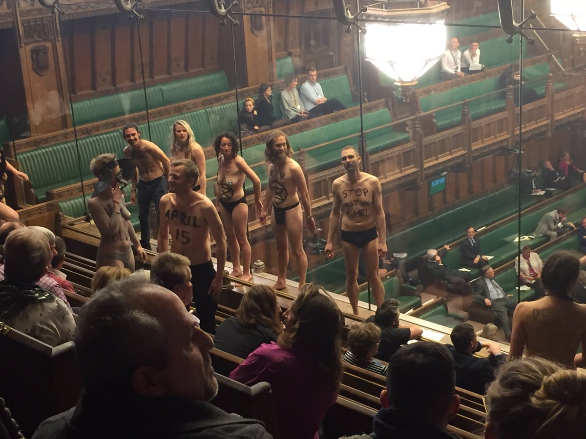 Climate Change Activists Stripped Semi-Naked In British Parliament