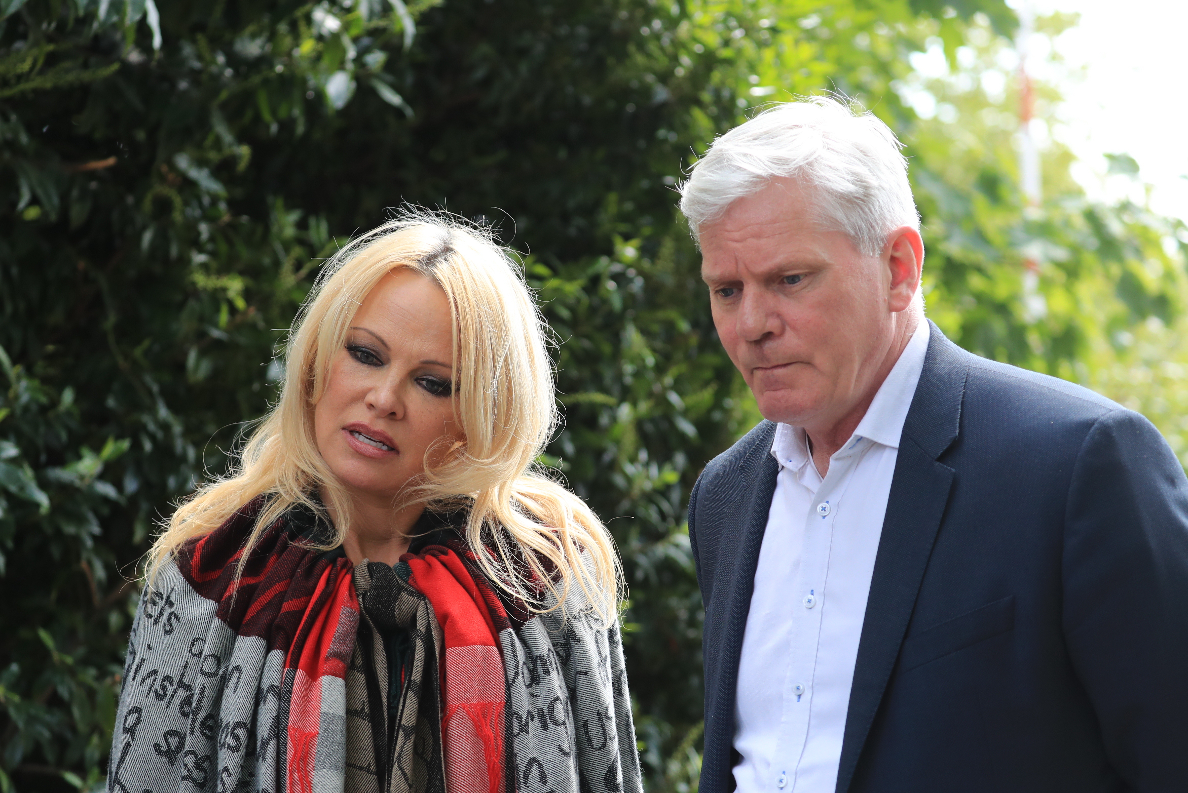 Pamela Anderson Redeclares Her Love for Julian Assange After Visiting