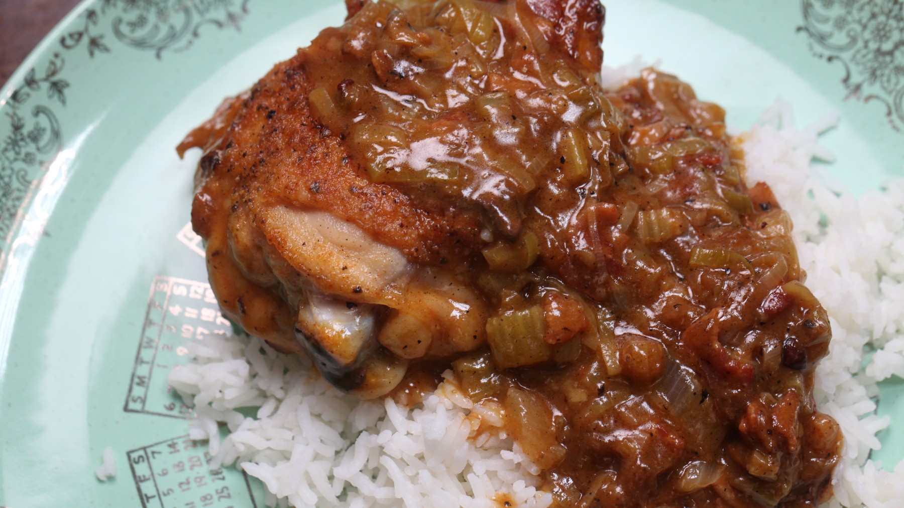 smothered chicken over rice