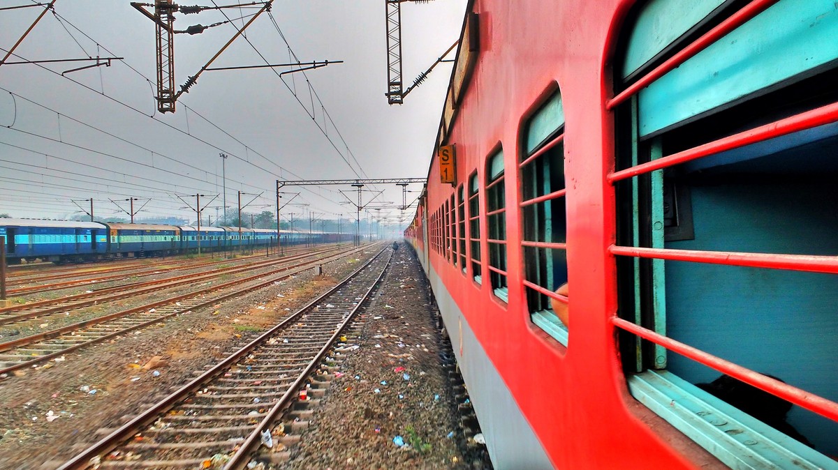 Train running. Train. Long Red Train. Header Red Train.