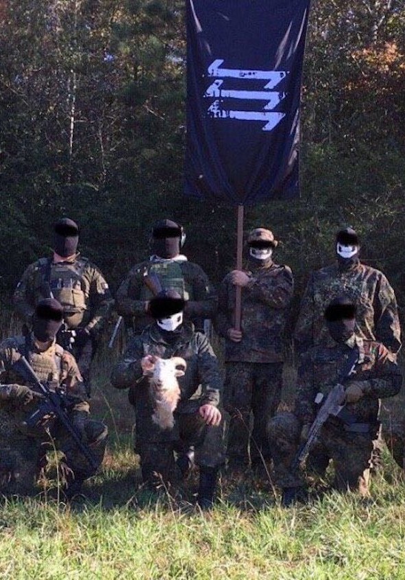 Neo-Nazi Terror Group The Base Linked to the War in Ukraine