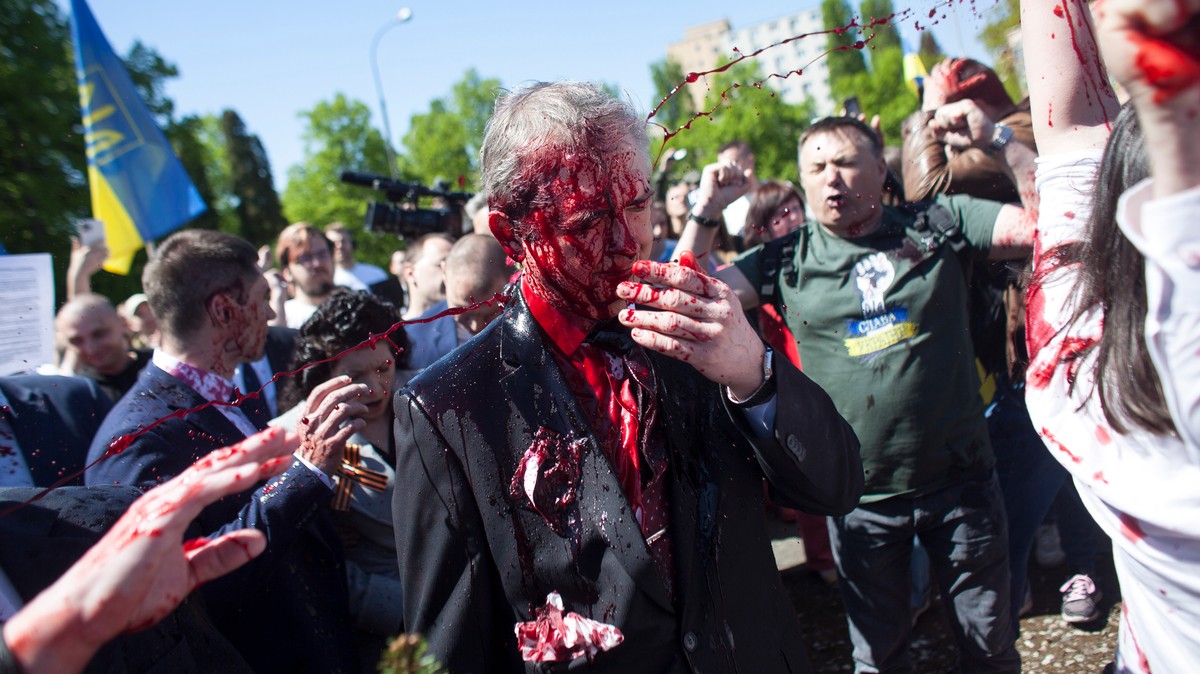 Russian Ambassador Splattered With Red Paint by Anti-War Activists in Poland