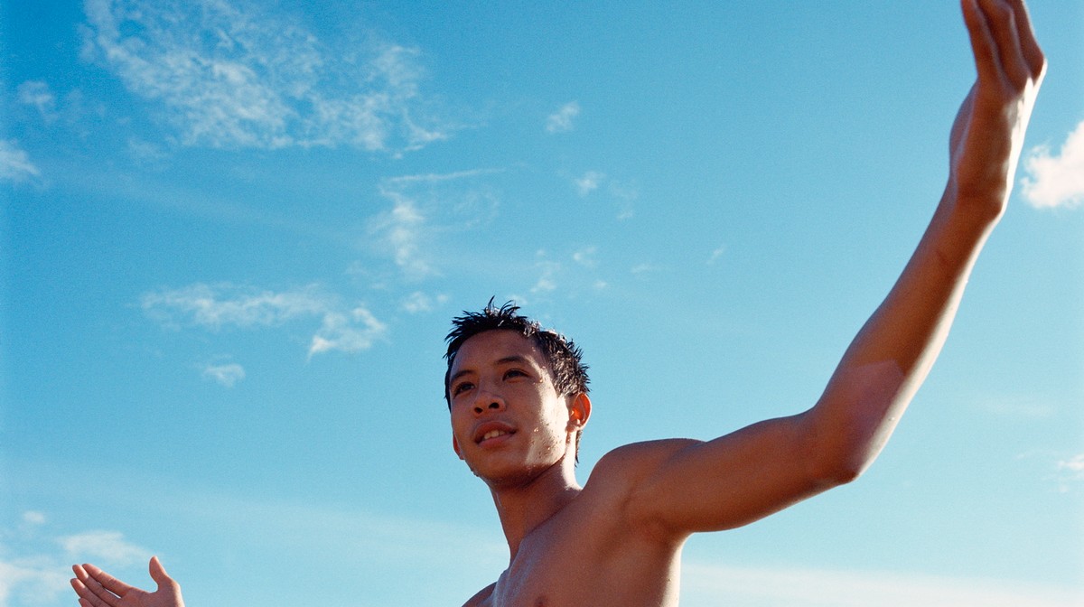 Sun-soaked photographs of locals and surfers on the beaches of Hawaii