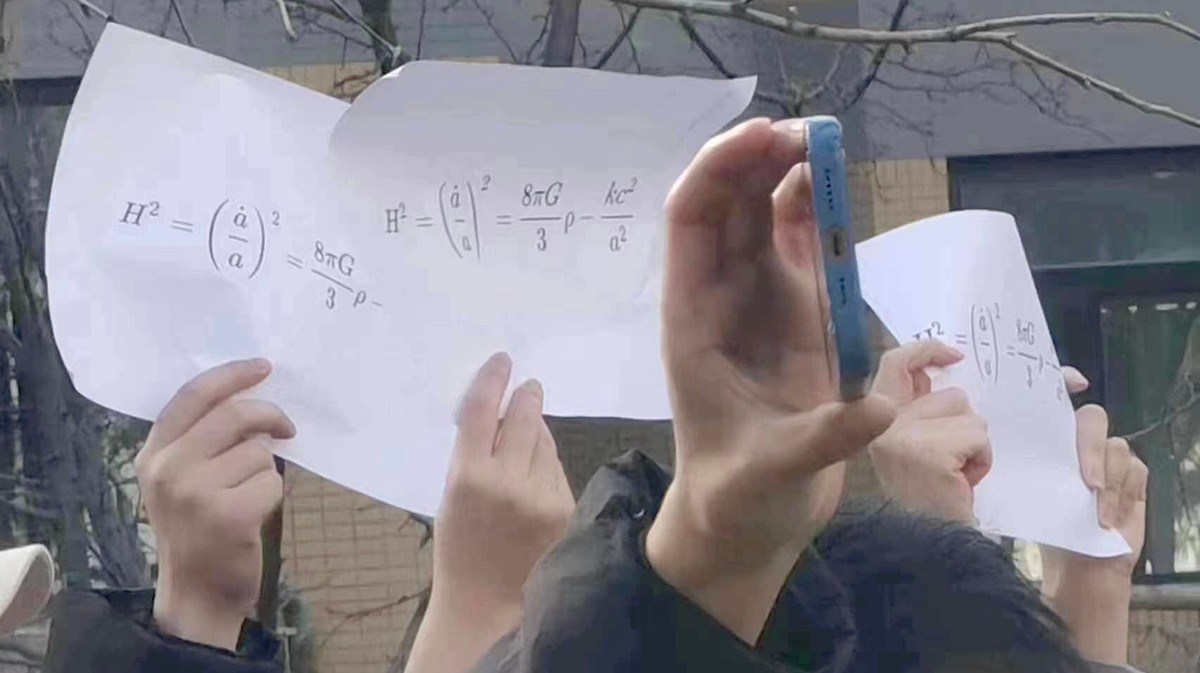 Why Are Students Holding Up This Physics Equation During China’s COVID Protests?