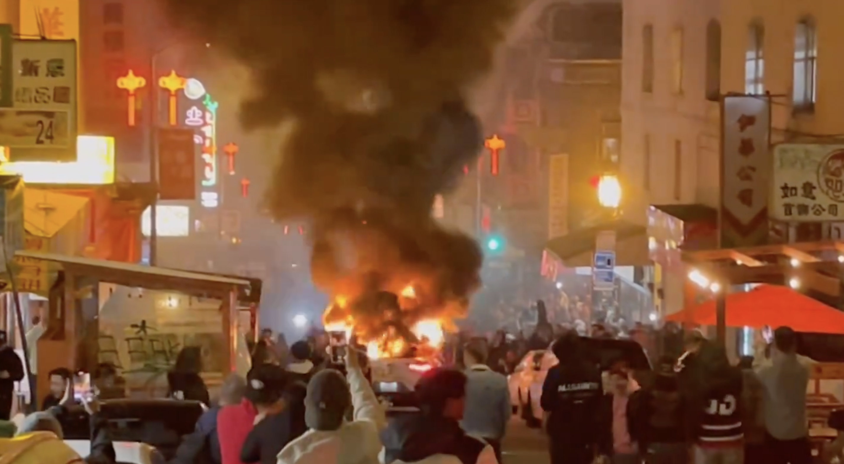 A crowd swarmed a Waymo self-driving car in San Francisco on Saturday night, pummeling the vehicle with cans, a skateboard, and eventually setting it 