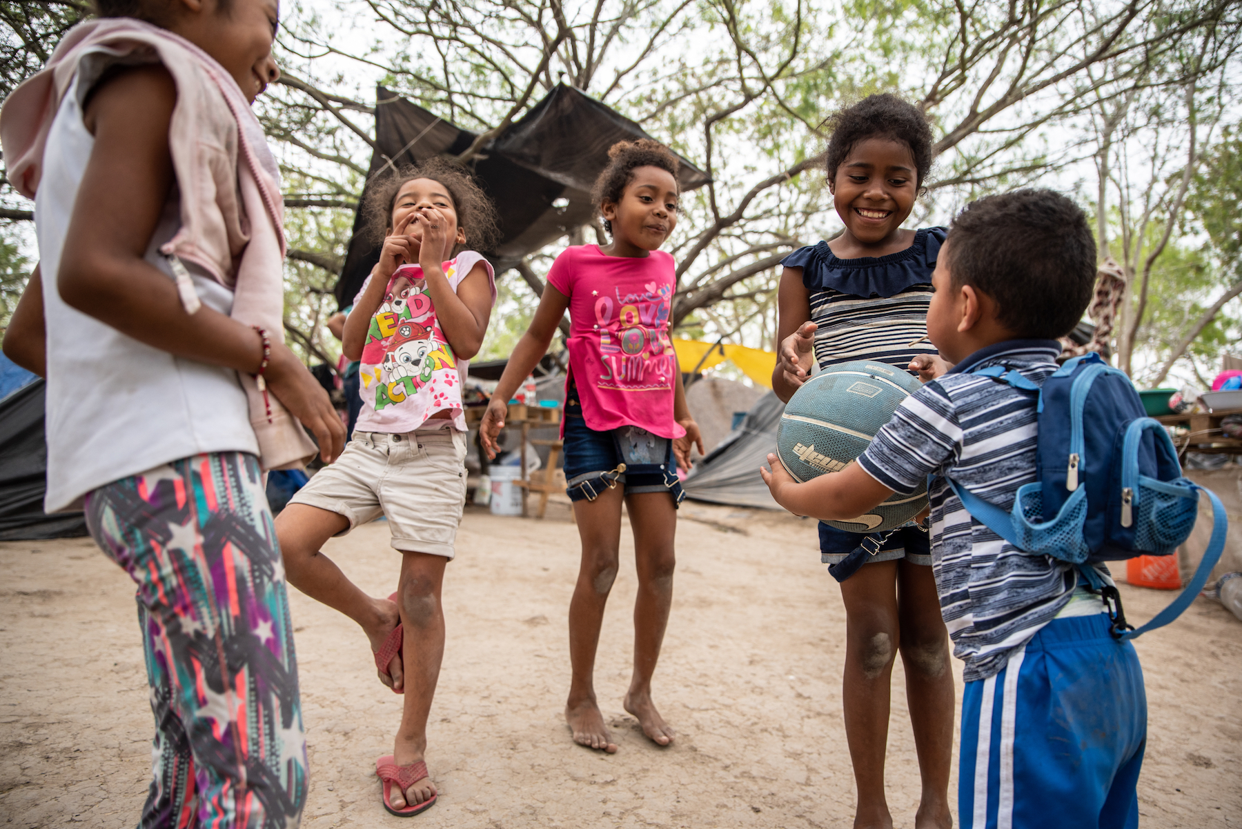 A group of children play 