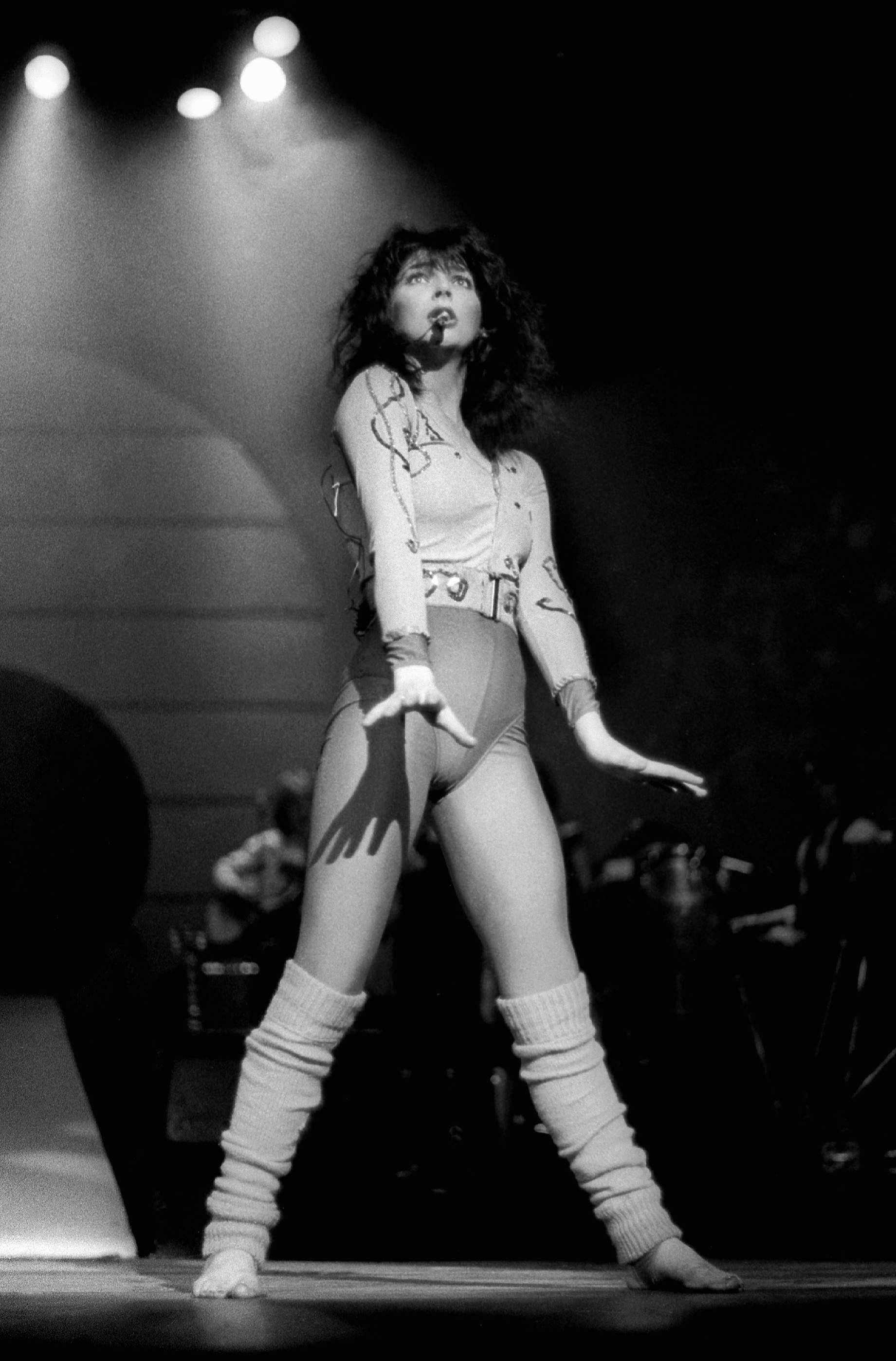 Kate Bush in a body suit, fitted top and leg warmers on the Tour of Life in...