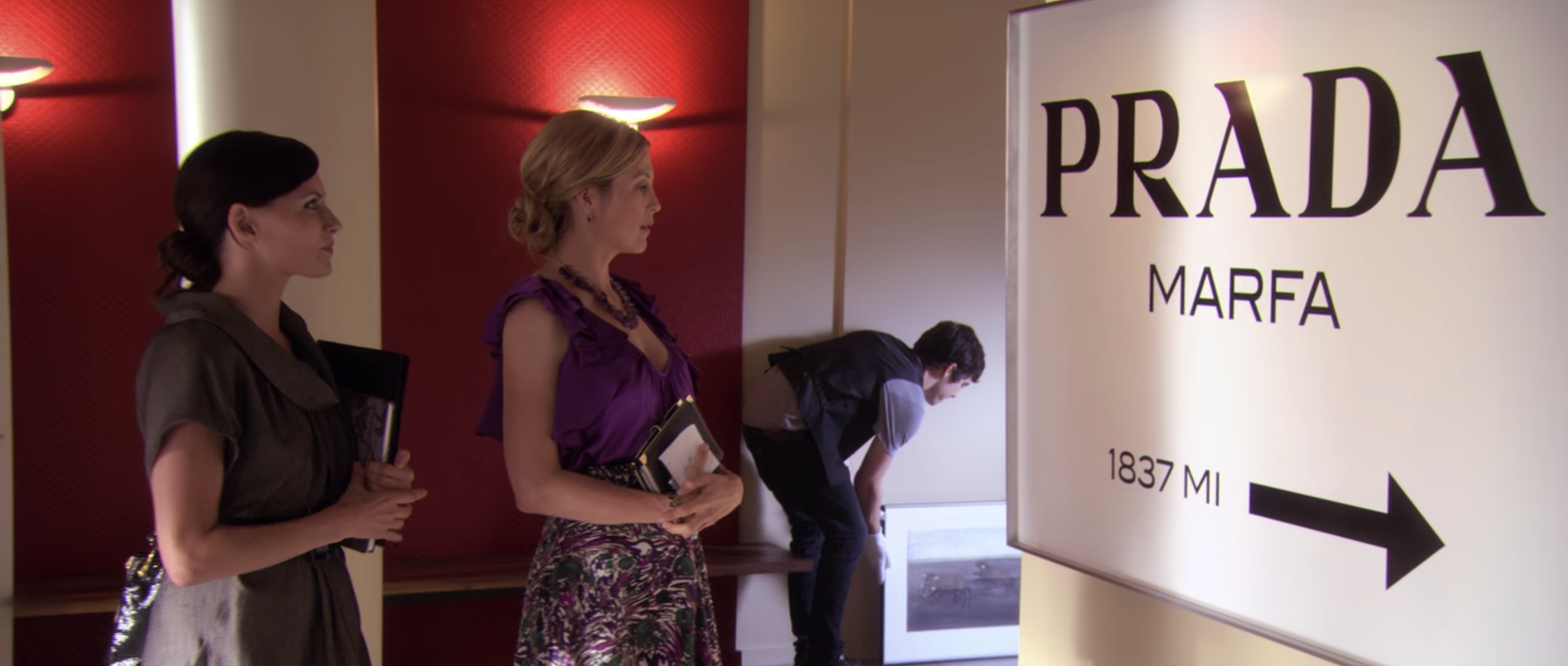 In Defense Of The Prada Marfa Sign In Gossip Girl Garage