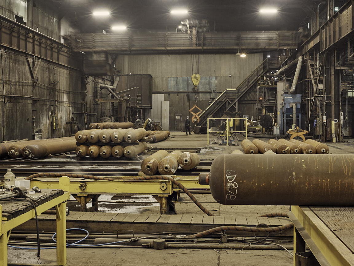 large metal tubes in a factory