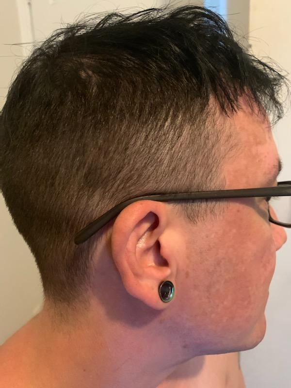 person showing off short haircut from the back