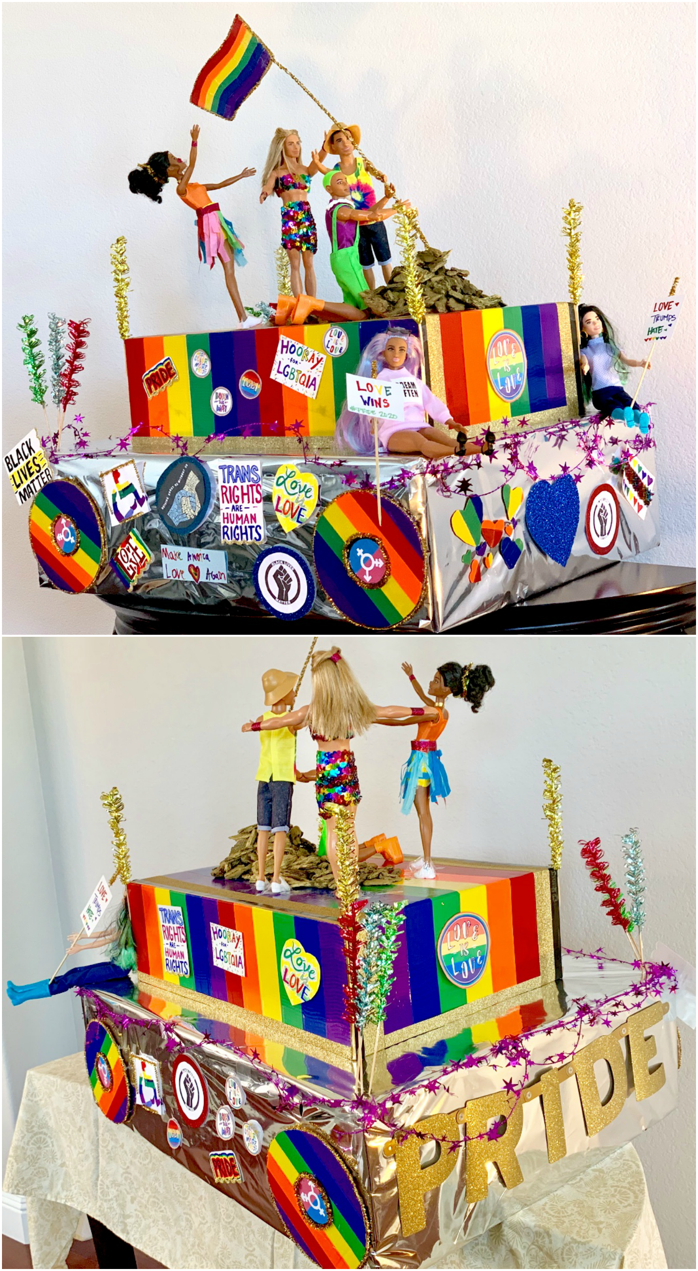 miniature diy pride float covered in rainbows, stickers, protest signs, with barbies on top