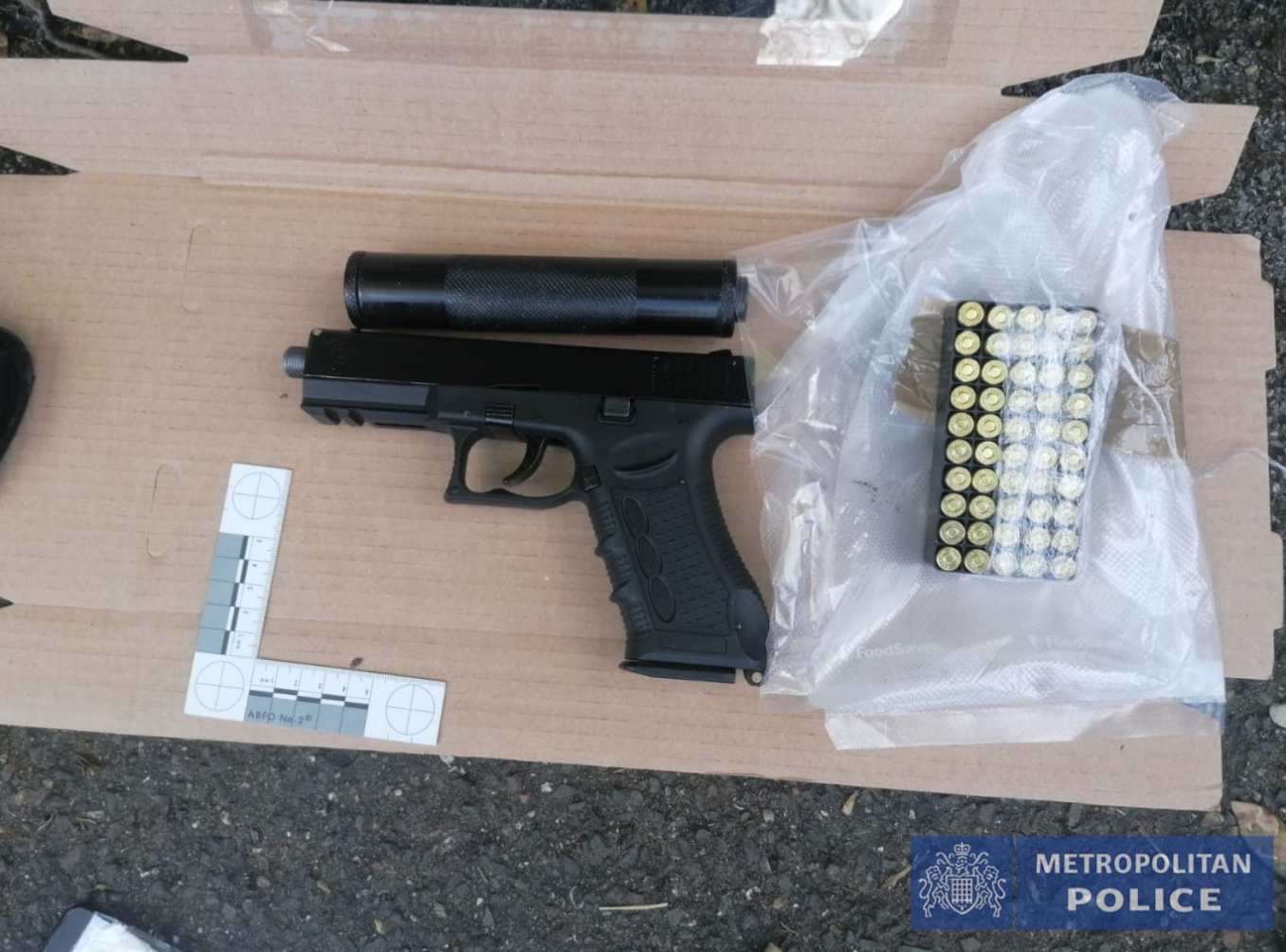 A gun and ammo recovered by the Met Police