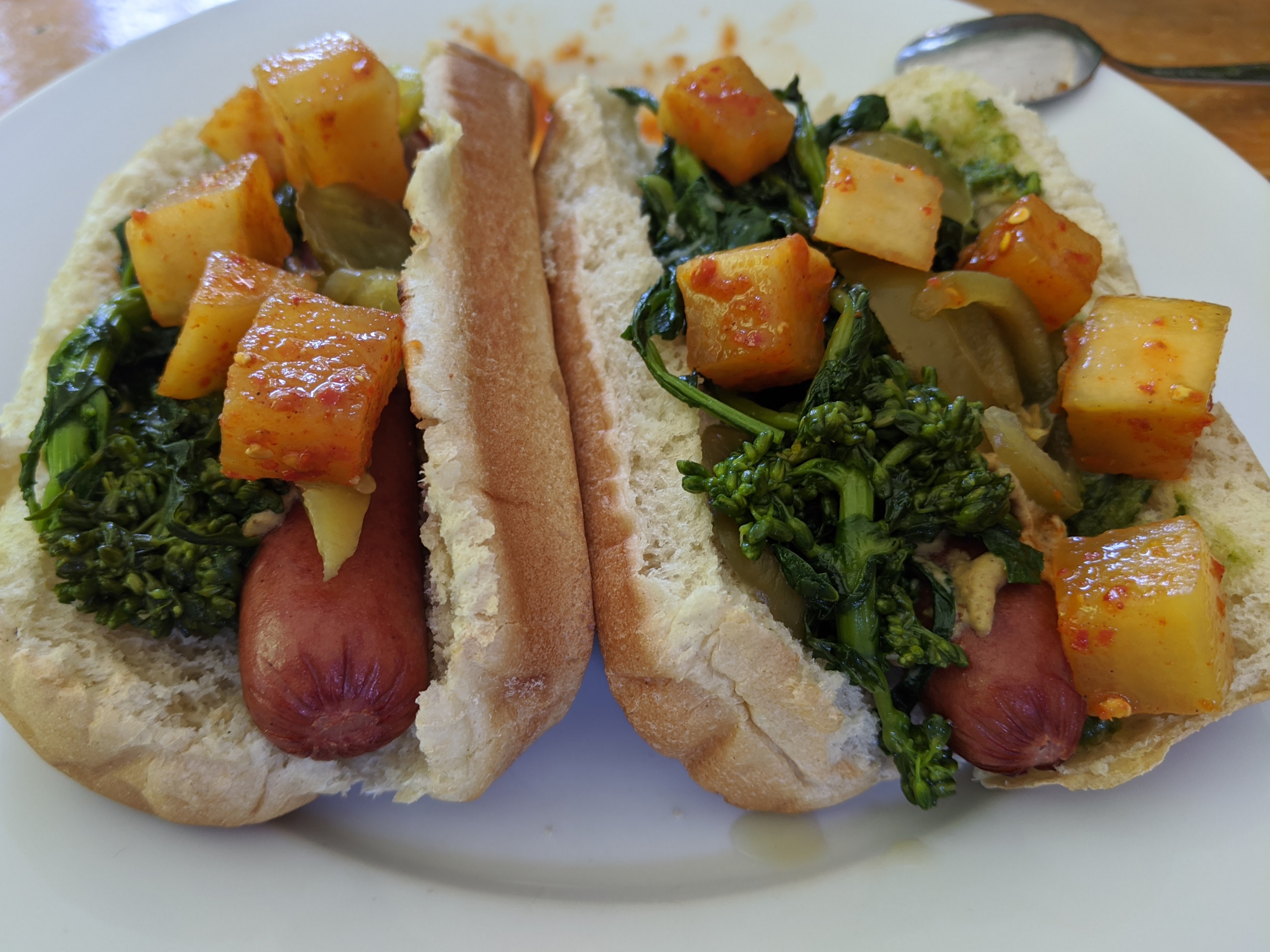 hot dogs with broccoli rabe, kimchi, and hot peppers