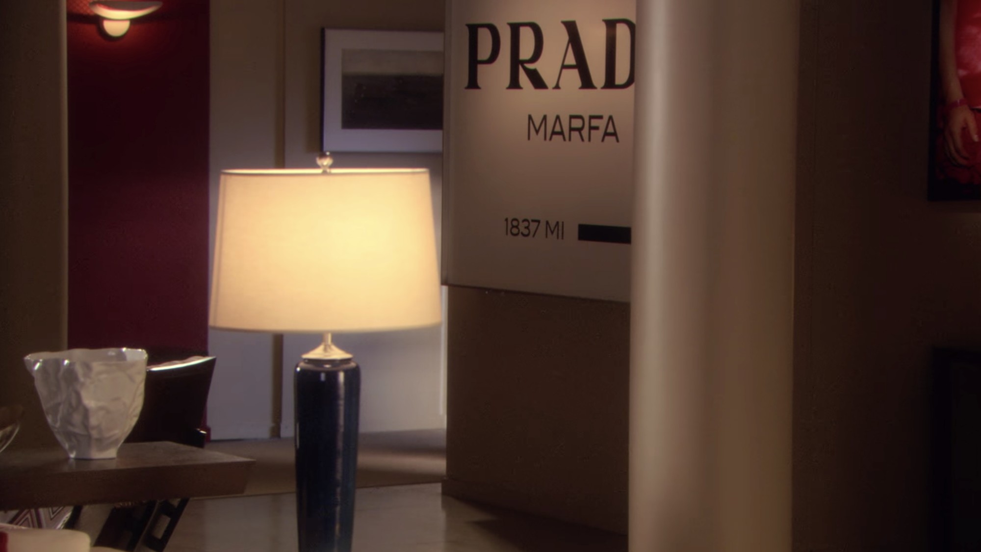 In Defense Of The Prada Marfa Sign In Gossip Girl Garage