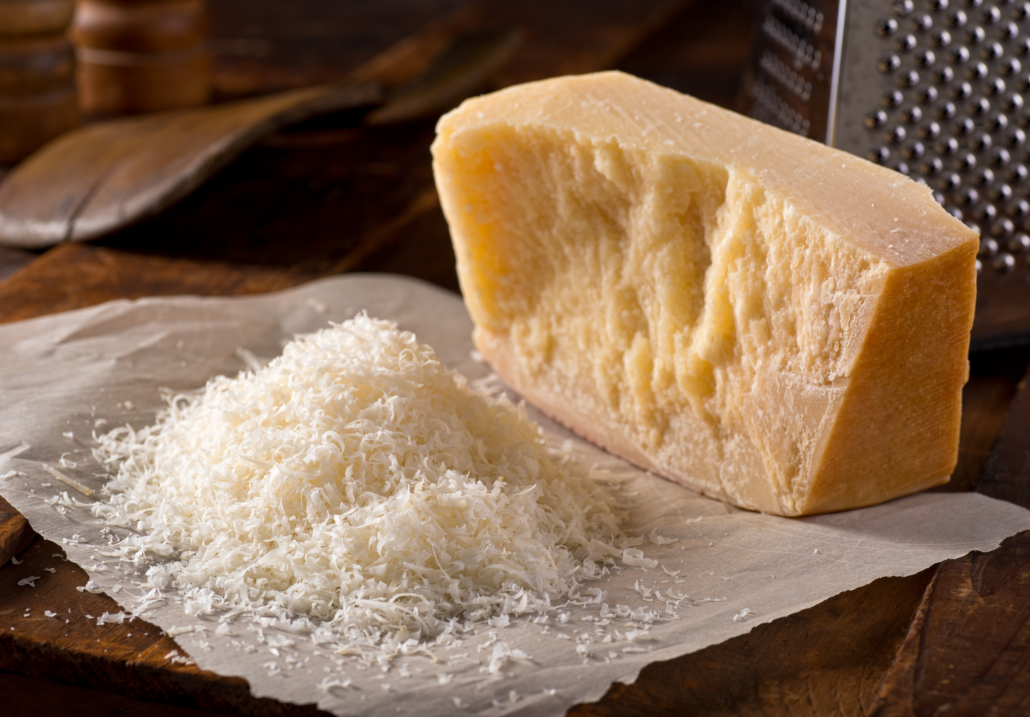 Students mix foot shavings with grated cheese