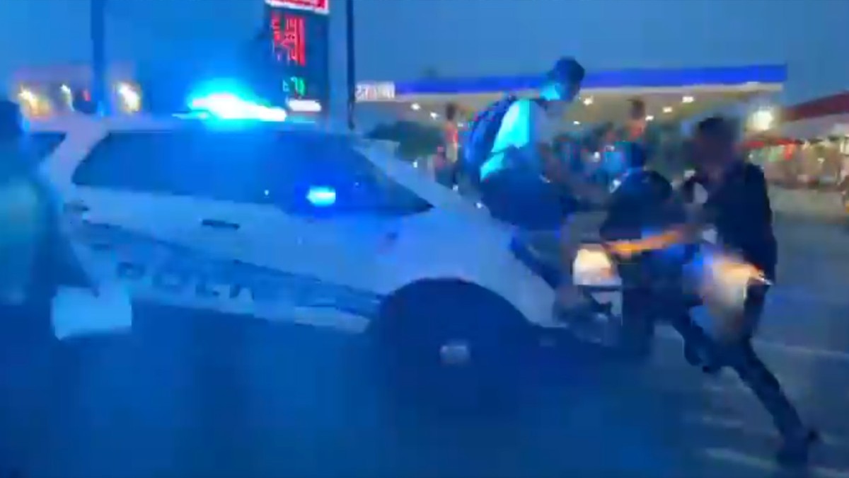 , A Detroit Cop Drove an SUV Through a Crowd and Sped Away With a Protester on the Hood, Saubio Making Wealth